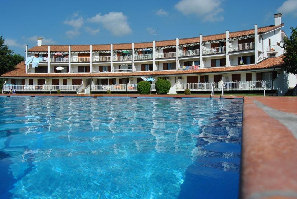 Residence Selenis Bilocale Vista Piscina - Agenzia Cocal 카오를레 외부 사진